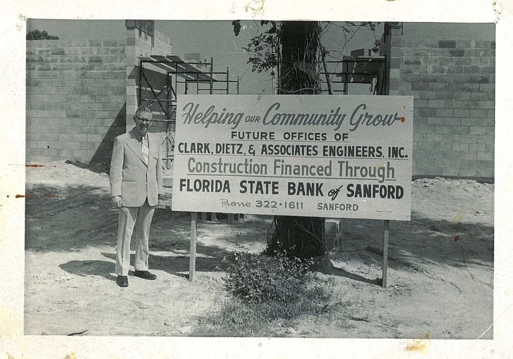 Mr. Conklin in front of sign