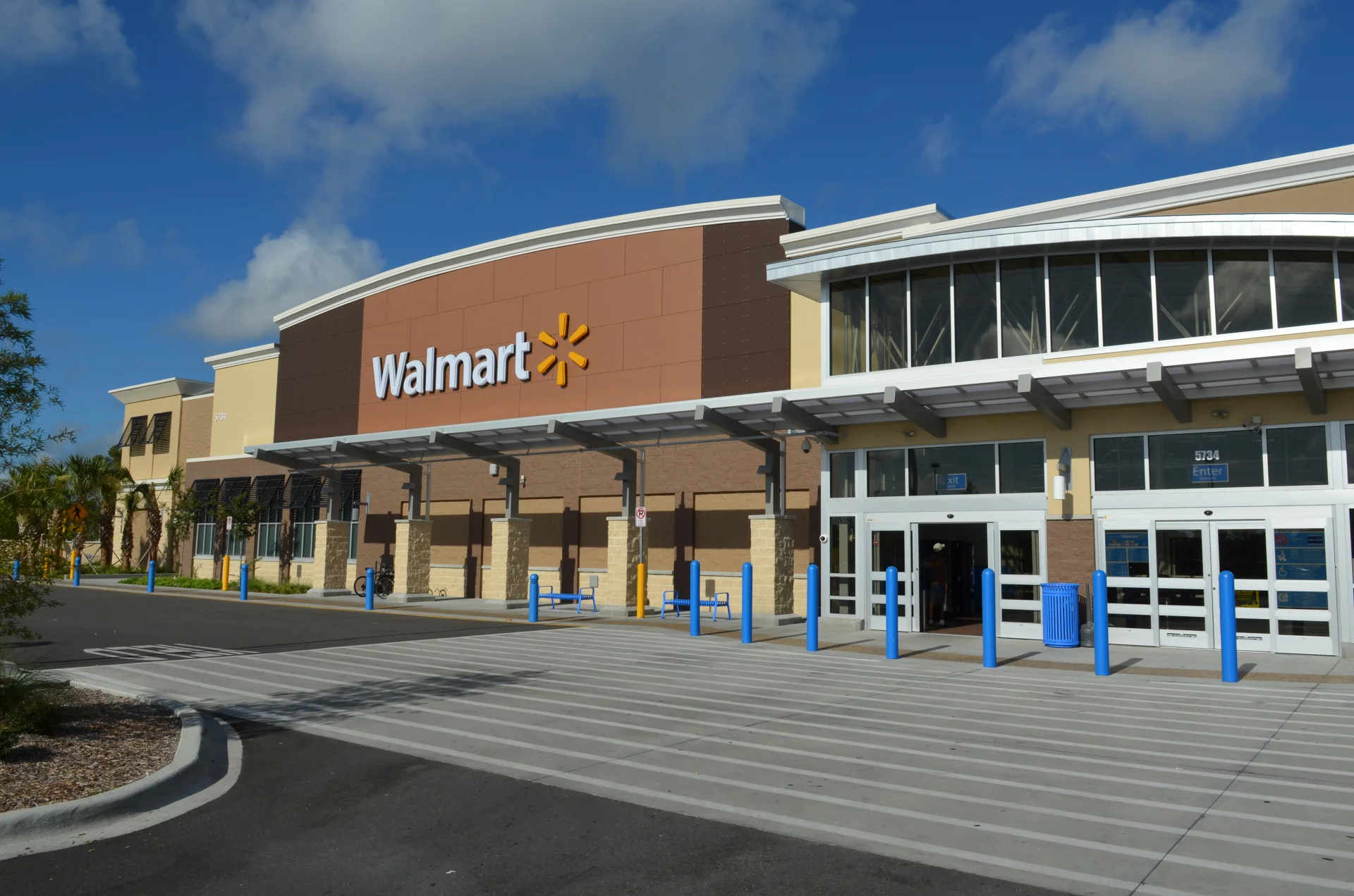 Walmart storefront and crosswalk front right view