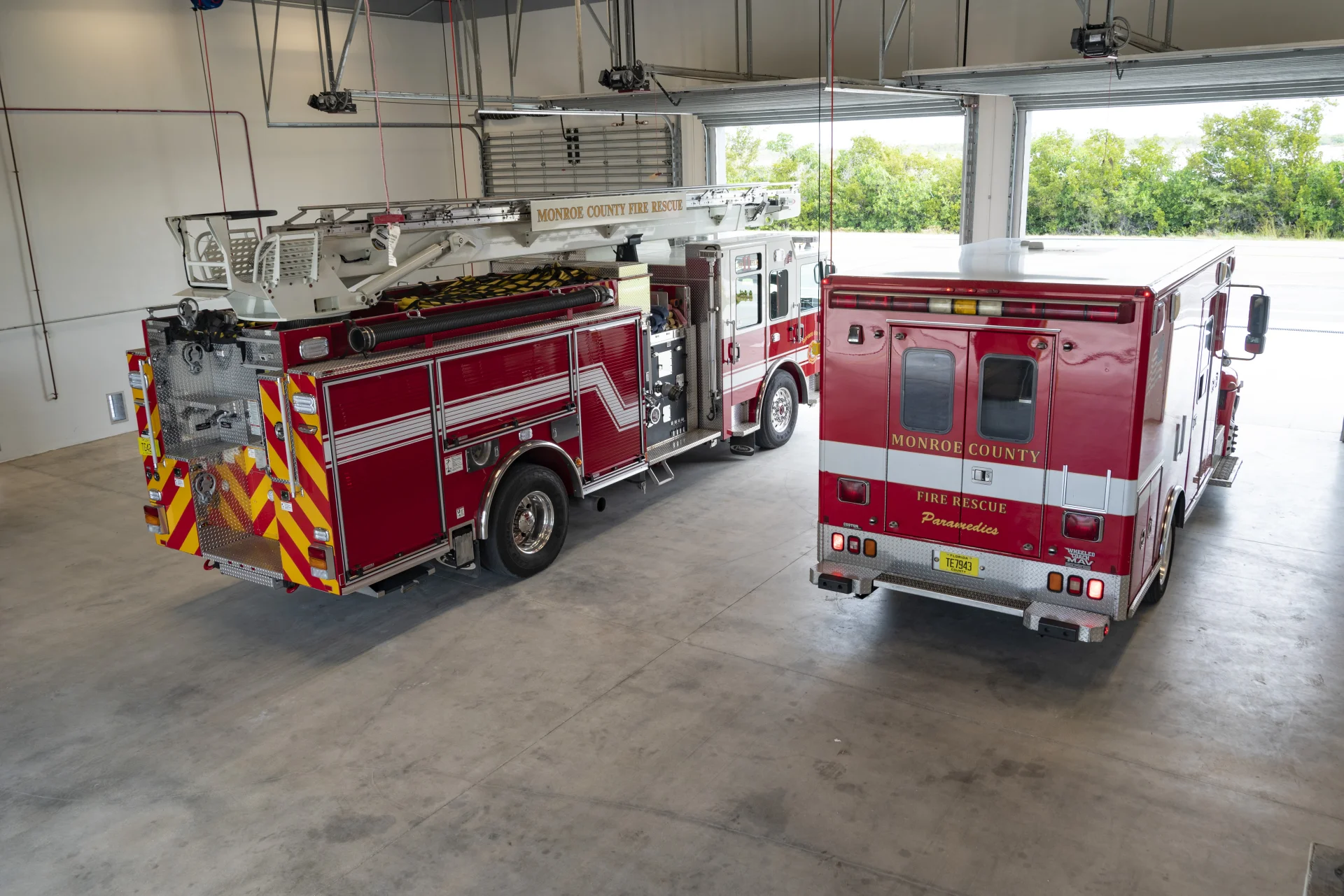 two trucks in truck bay