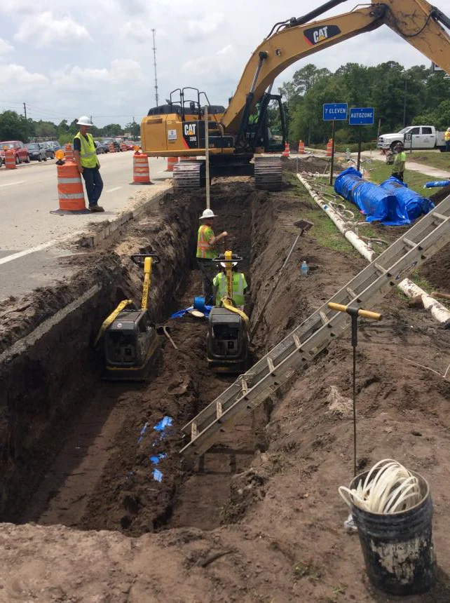 workers excavating land