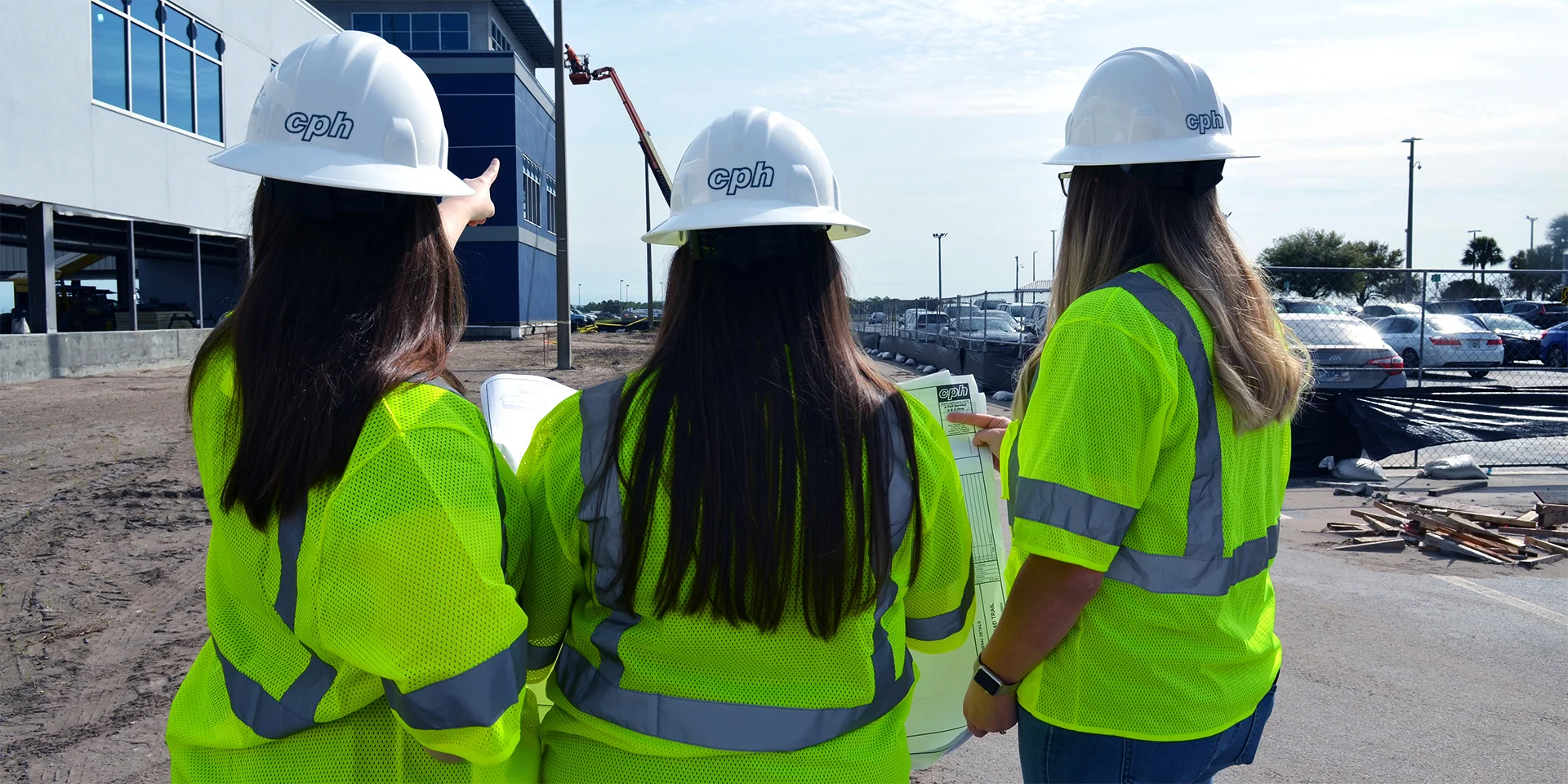 CPH employees reading blueprint