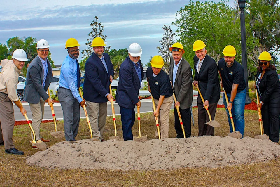 CPH employees digging at new site opening