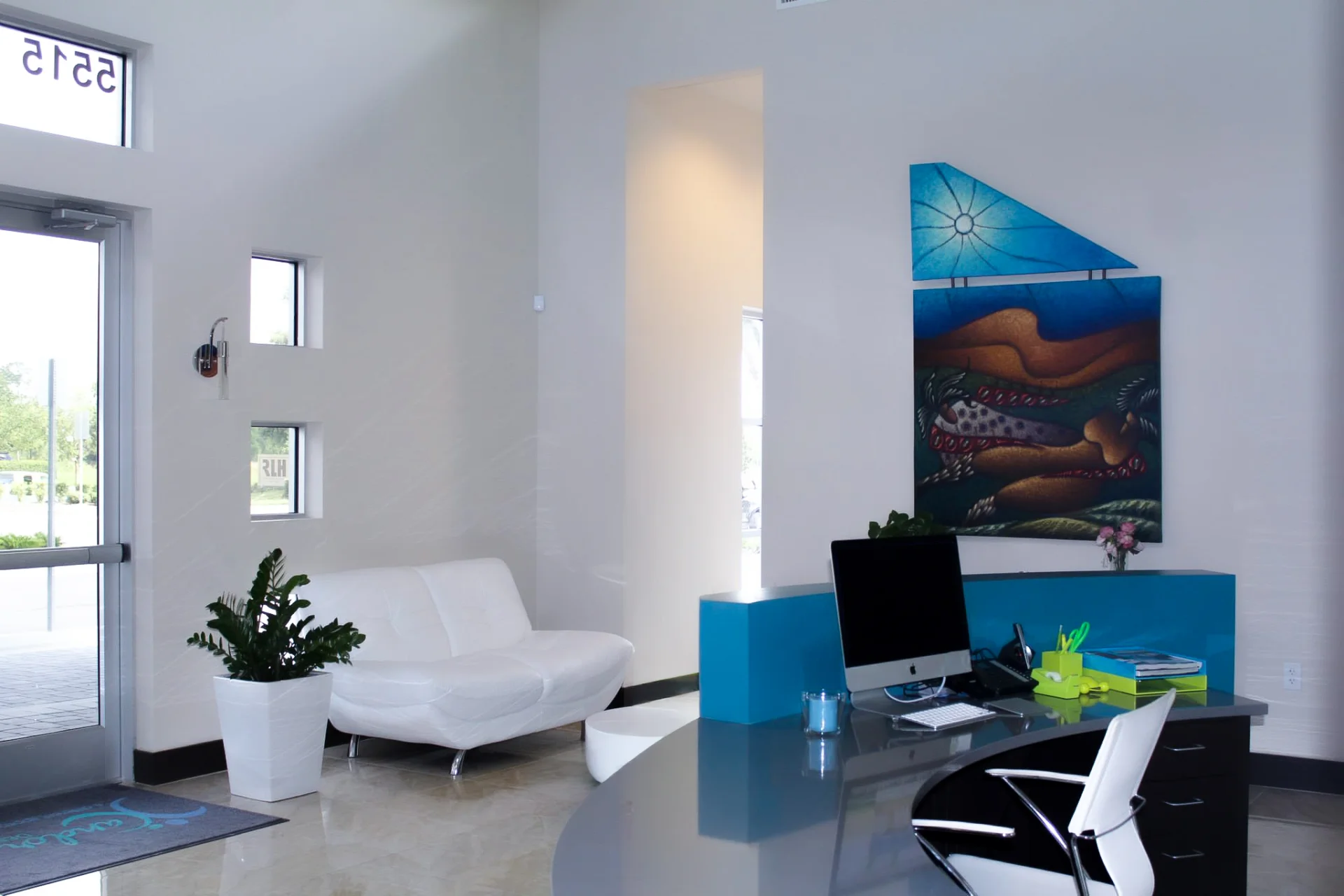 Kandor Dental Spa reception desk and waiting couch